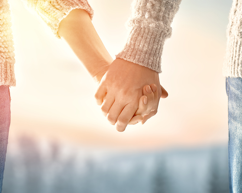 Couple holding hands for couples counseling in Bel Air, MD