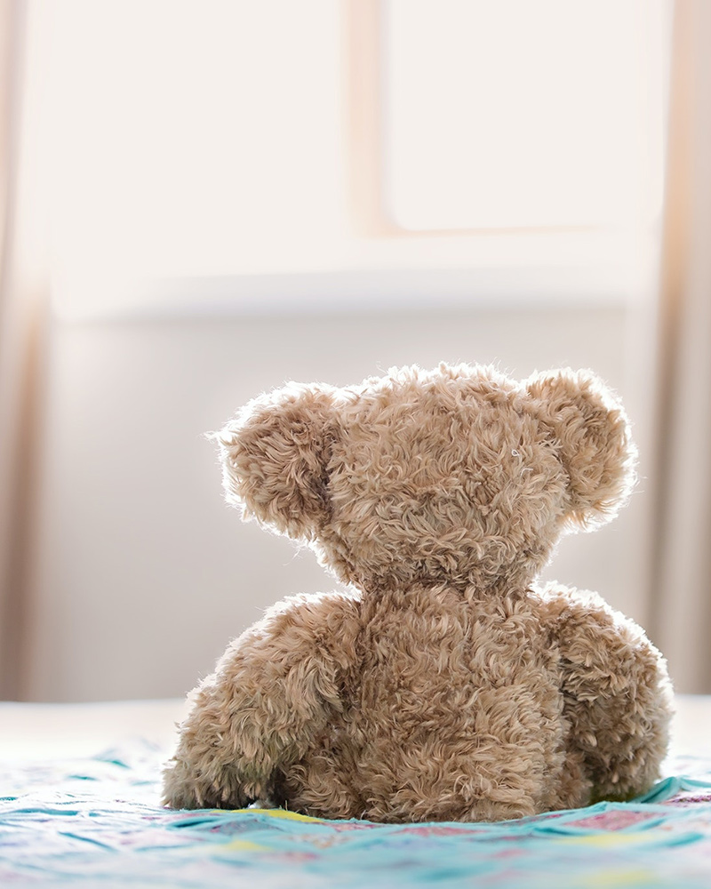 Teddy bear on the bed - maternal mental health therapist in Bel Air, MD