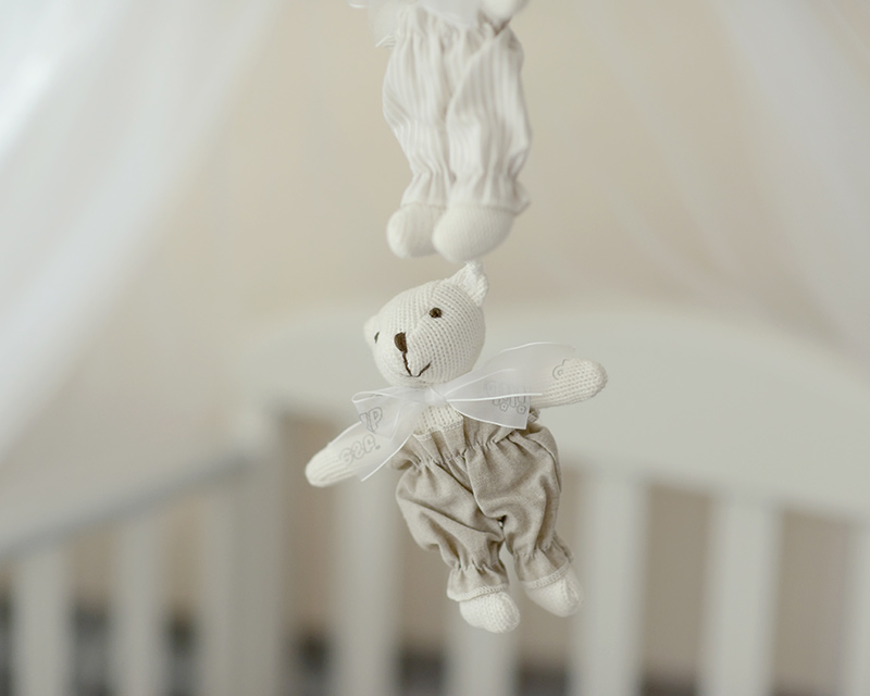 Baby Bear hanging from crib - Third Party Reproduction Evaluations in Bel Air, MD